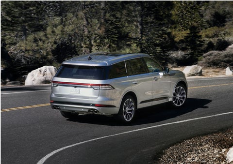 A Lincoln Aviator® is being driven on a winding road | Lexington Park Ford Lincoln in California MD