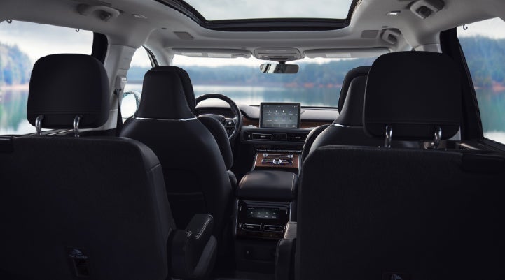 The interior of a 2024 Lincoln Aviator® SUV from behind the second row | Lexington Park Ford Lincoln in California MD