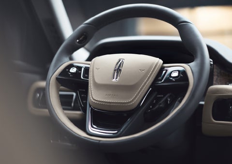 The intuitively placed controls of the steering wheel on a 2024 Lincoln Aviator® SUV | Lexington Park Ford Lincoln in California MD