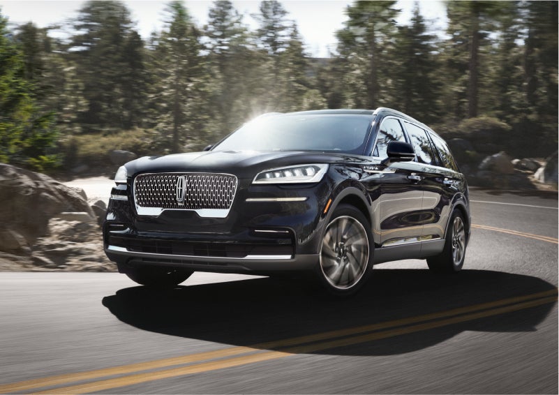 A Lincoln Aviator® SUV is being driven on a winding mountain road | Lexington Park Ford Lincoln in California MD