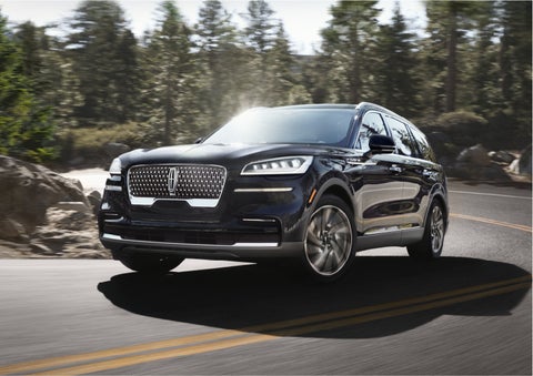 A Lincoln Aviator® SUV is being driven on a winding mountain road | Lexington Park Ford Lincoln in California MD