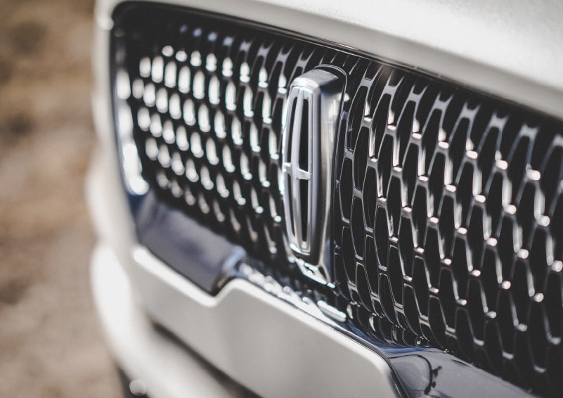 The grille of the 2024 Lincoln Aviator® Reserve model with an eye-catching repeated field of Lincoln Star logo shapes | Lexington Park Ford Lincoln in California MD