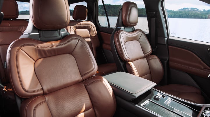 The front row's Perfect Position Seats in a 2024 Lincoln Aviator® Reserve model with Ebony Roast interior | Lexington Park Ford Lincoln in California MD