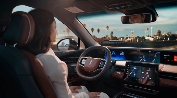 A person is shown driving hands-free on the highway with available Lincoln BlueCruise technology. | Lexington Park Ford Lincoln in California MD