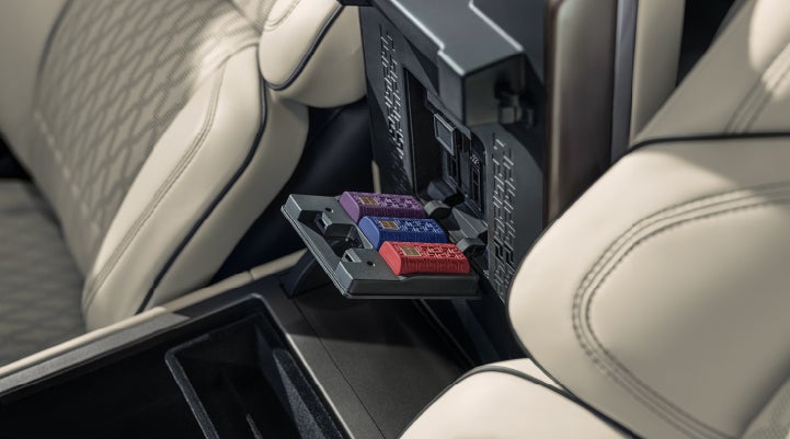 Digital Scent cartridges are shown in the diffuser located in the center arm rest. | Lexington Park Ford Lincoln in California MD