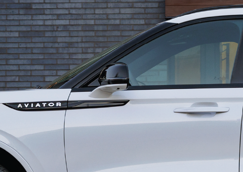 The driver’s door of a white 2025 Lincoln Aviator® SUV is showcased. | Lexington Park Ford Lincoln in California MD