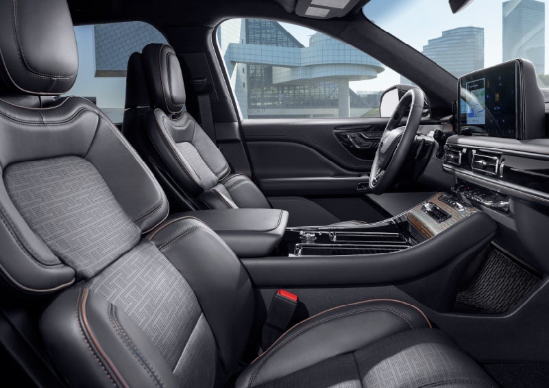 The interior of the 2025 Lincoln Aviator® SUV is shown with sleek black accents. | Lexington Park Ford Lincoln in California MD