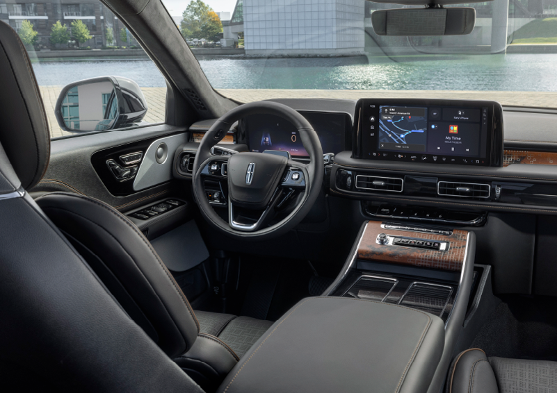 The interior of the 2025 Lincoln Aviator® SUV is shown parked with a view of a harbor through the windshield. | Lexington Park Ford Lincoln in California MD