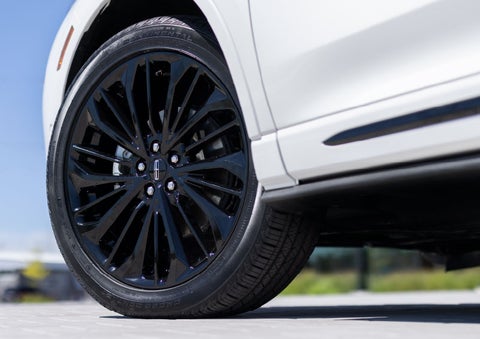 A stylish 20-inch black aluminum wheel of the available Jet Appearance Package is shown. | Lexington Park Ford Lincoln in California MD