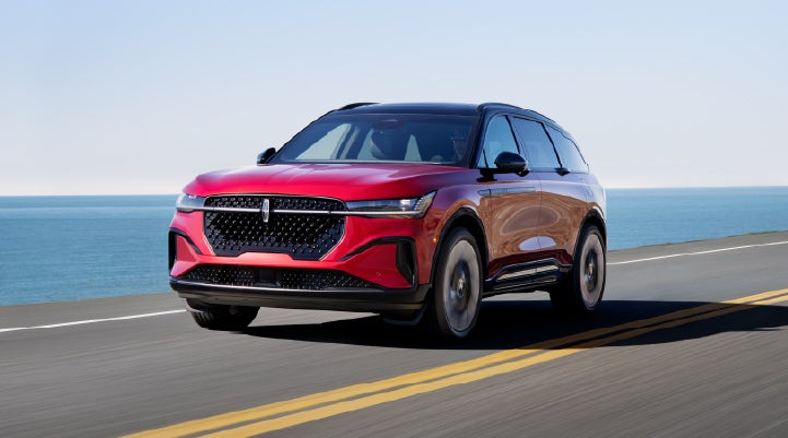 A 2025 Lincoln Nautilus® SUV is being driven on a seaside roadway. | Lexington Park Ford Lincoln in California MD