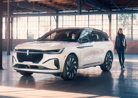 A person approaches a 2025 Lincoln Nautilus® SUV. | Lexington Park Ford Lincoln in California MD