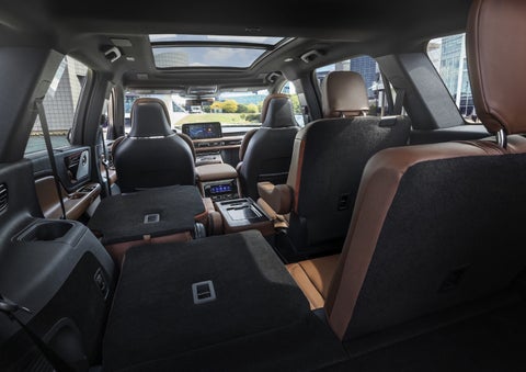 One side of the PowerFold® third-row seat and a second-row seat are folded forward in the 2026 Lincoln Aviator® SUV. | Lexington Park Ford Lincoln in California MD