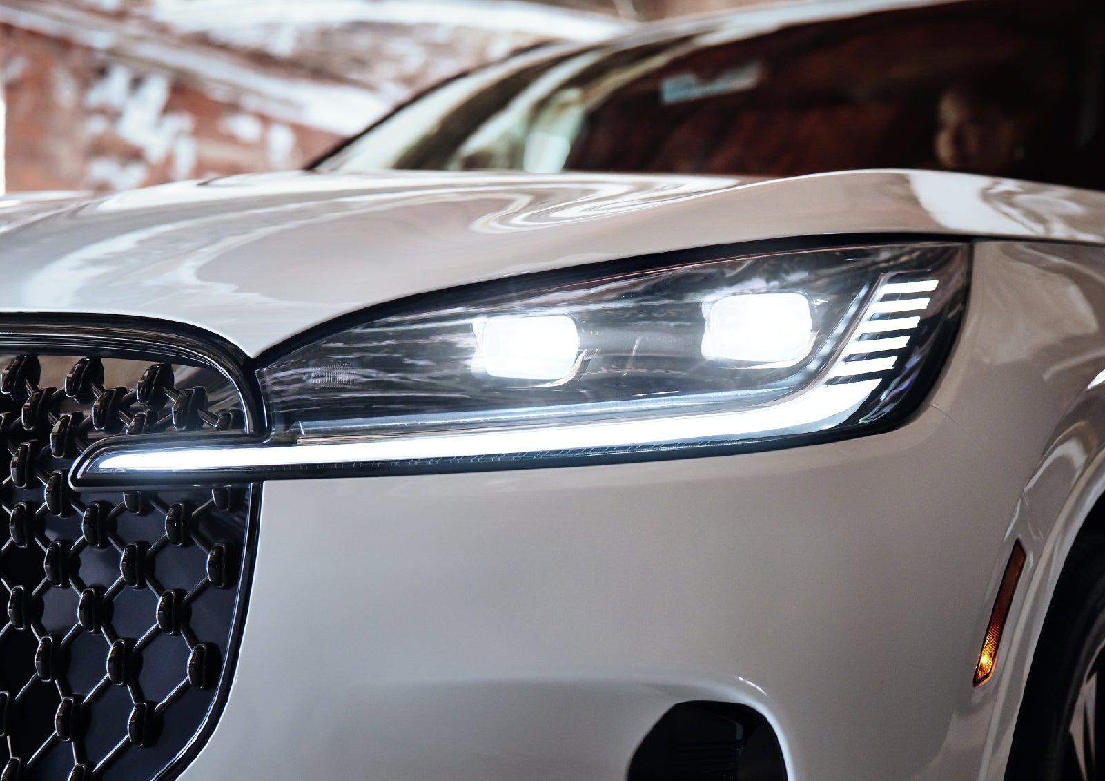 A close-up of a headlamp on the 2027 Lincoln Aviator® SUV is shown. | Lexington Park Lincoln in California MD