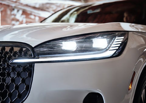 A close-up of a headlamp on the 2027 Lincoln Aviator® SUV is shown. | Lexington Park Lincoln in California MD