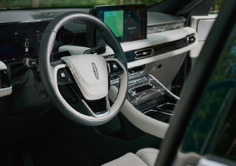 The leather-trimmed steering wheel of a 2027 Lincoln Aviator® Black Label™ SUV. | Lexington Park Lincoln in California MD